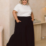 Model in Chic Women's Plus Size Black Pants - Maya Pants in Black