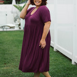 Model Showcasing Vibrant Plus Size Dress - Ashleigh Dress in Berry