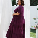 Model wearing plus size dress with pockets - Harlow Dress in Berry by Peach The Label