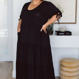 Model wearing stylish plus size black dress - Harlow Dress in Black by Peach The Label