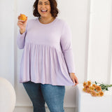 Plus Size clothing,  women modeling a Womens Plus Size Tops, Lucy Long Sleeve Top in Purple Lilac