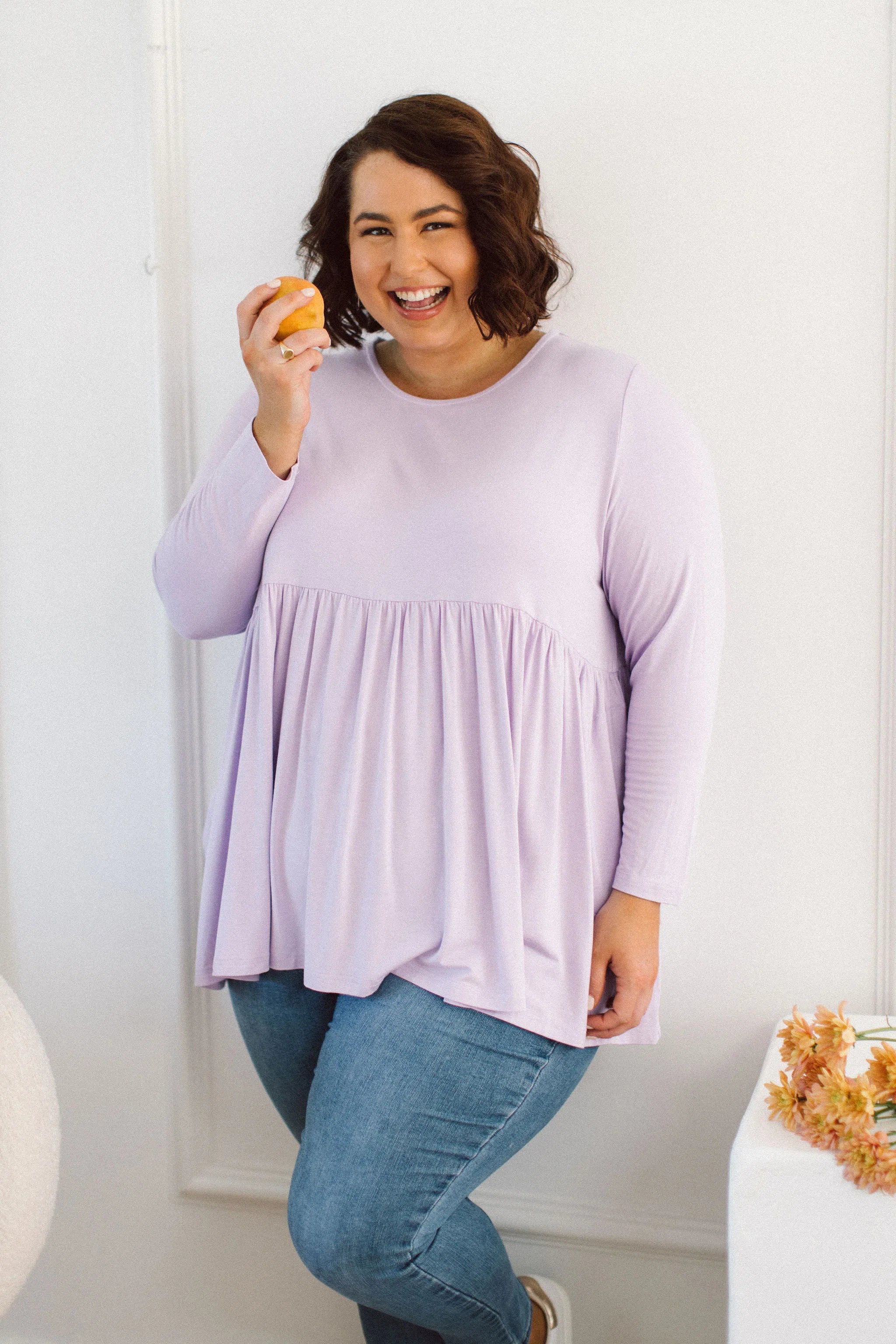 Plus Size clothing,  women modeling a Plus size womens shirt, Lucy Long Sleeve Top in Purple Lilac