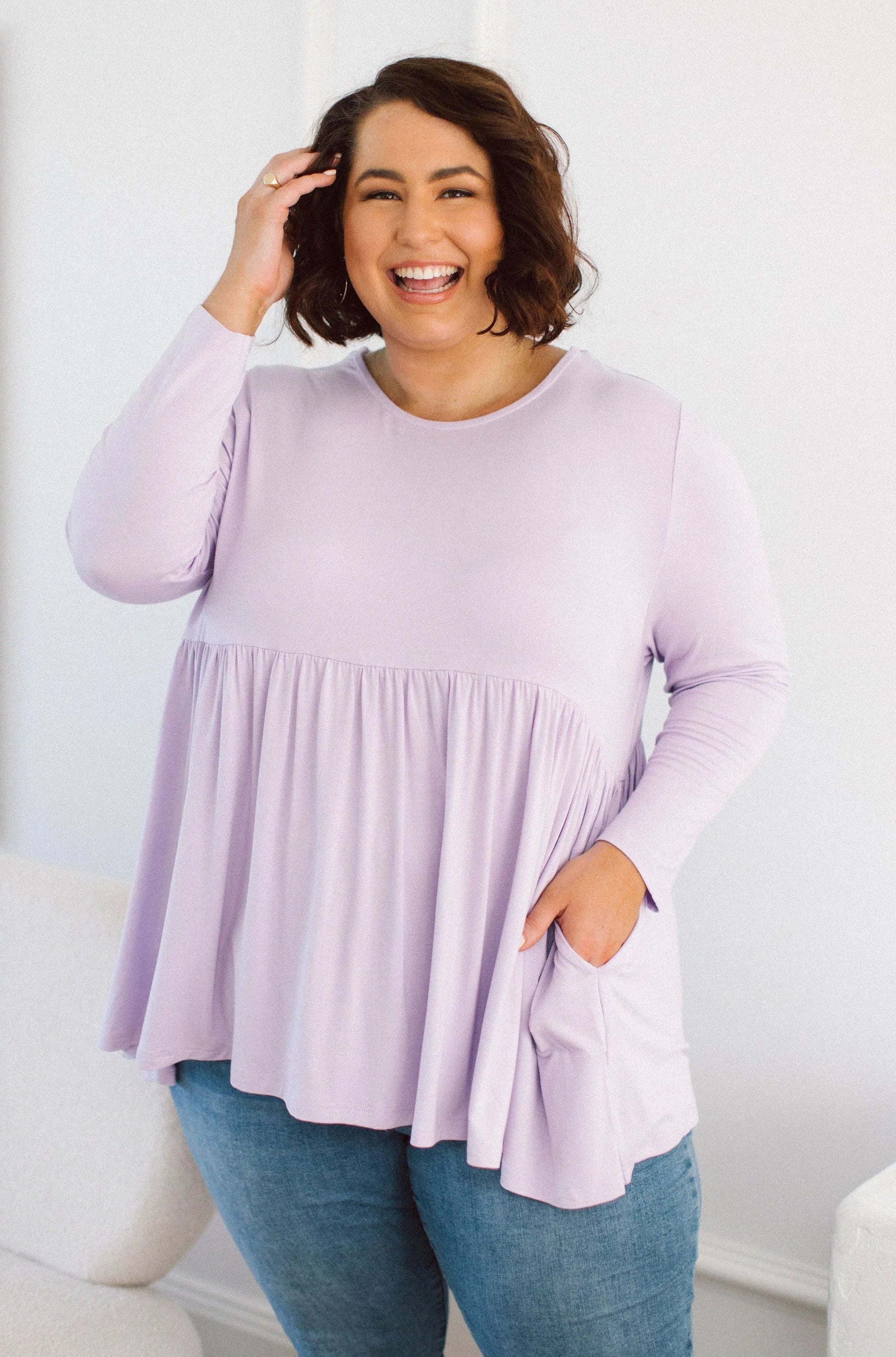 Plus Size clothing, women modeling a Plus Size Long Sleeve Shirt - Embrace Lilac Charm with Lucy Long Sleeve Top