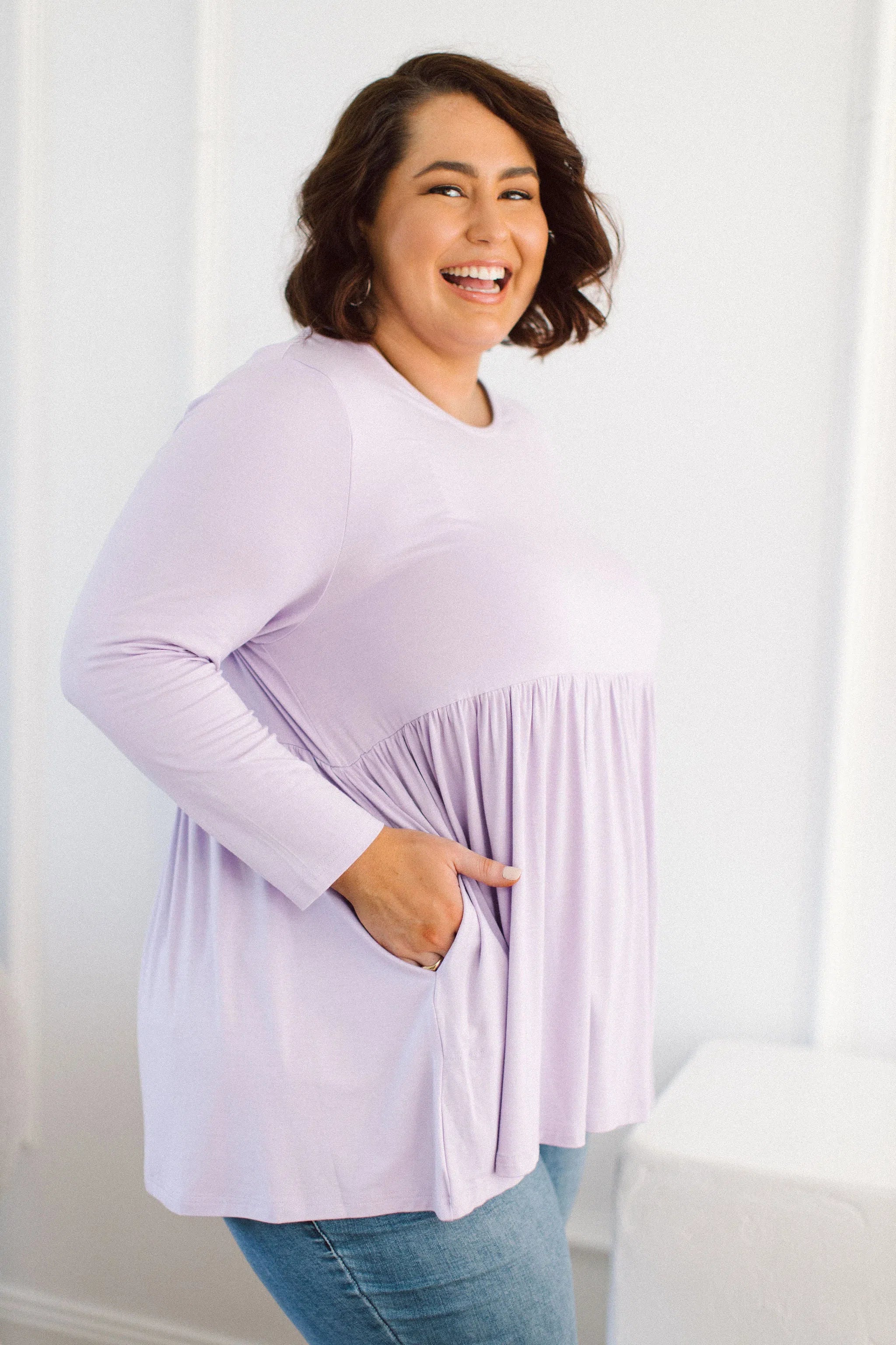 Plus Size clothing,  women modeling a Curvy Womens Tops, Lucy Long Sleeve Top in Purple Lilac