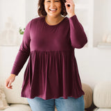 Plus Size clothing,  women modeling a Womens Plus Size Tops, Lucy Long Sleeve Top in Purple berry