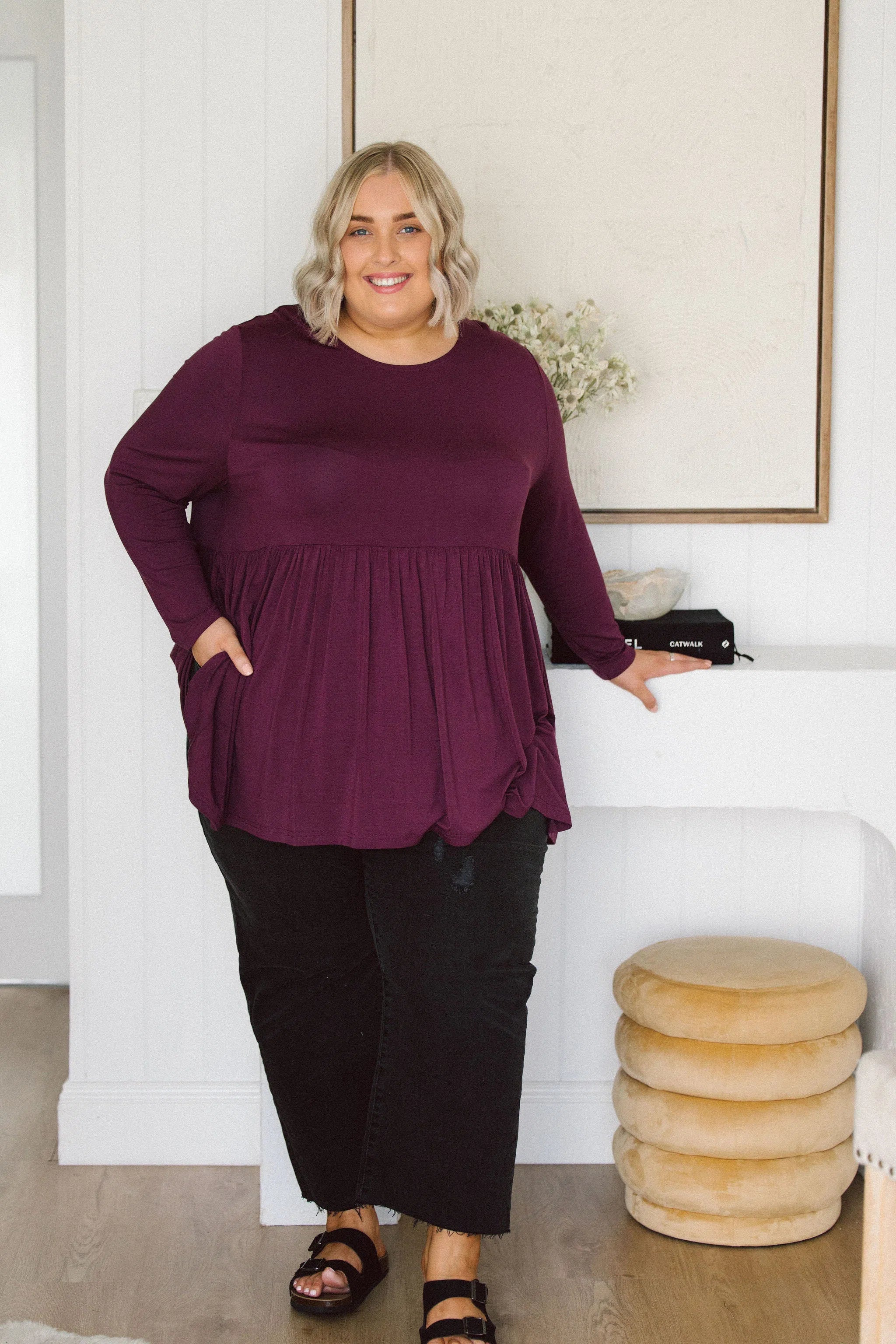 Plus Size clothing,  women modeling a Curvy Womens Tops, Lucy Long Sleeve Top in Purple berry