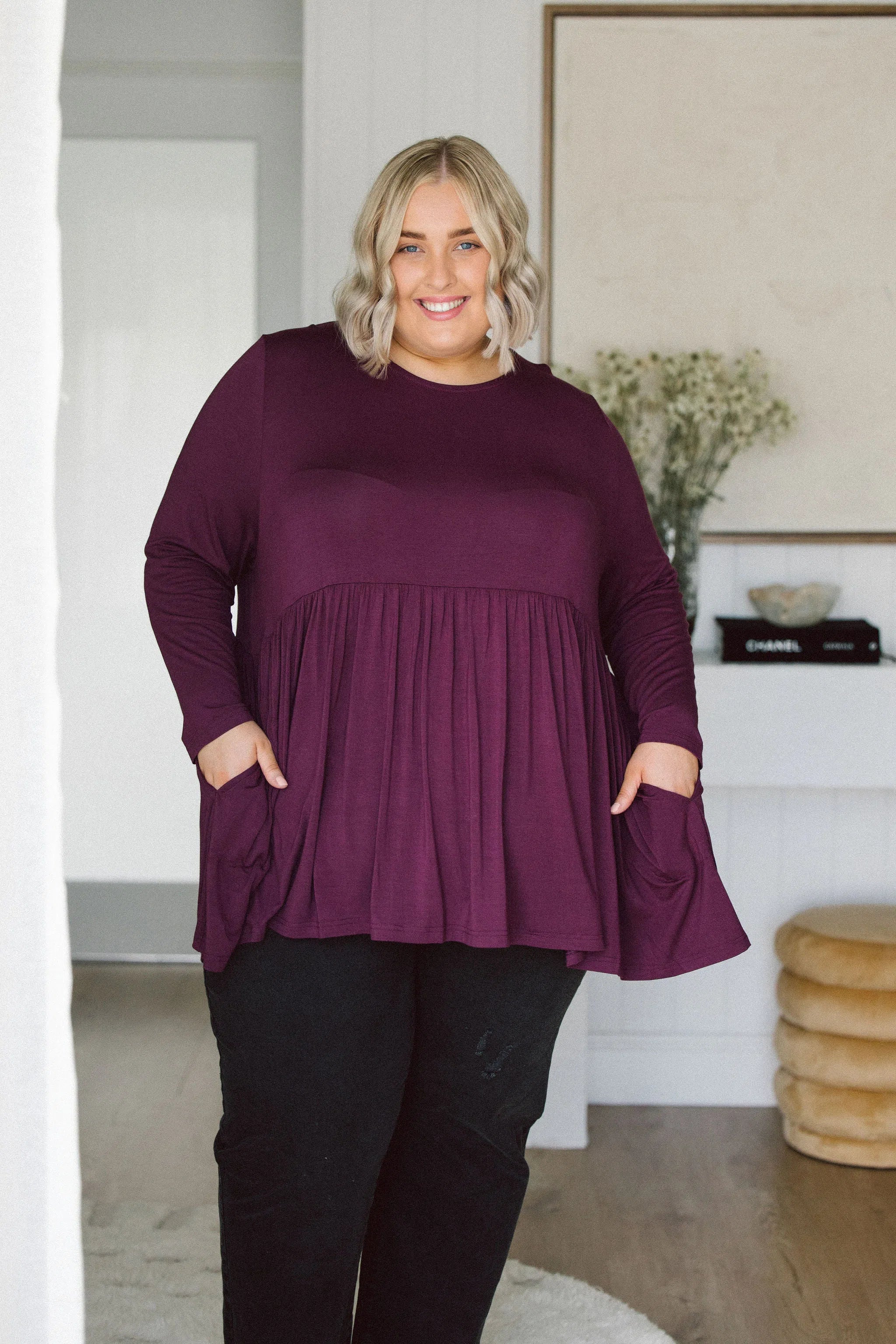 Plus Size clothing,  women modeling a Plus Size Tops, Lucy Long Sleeve Top in Purple berry