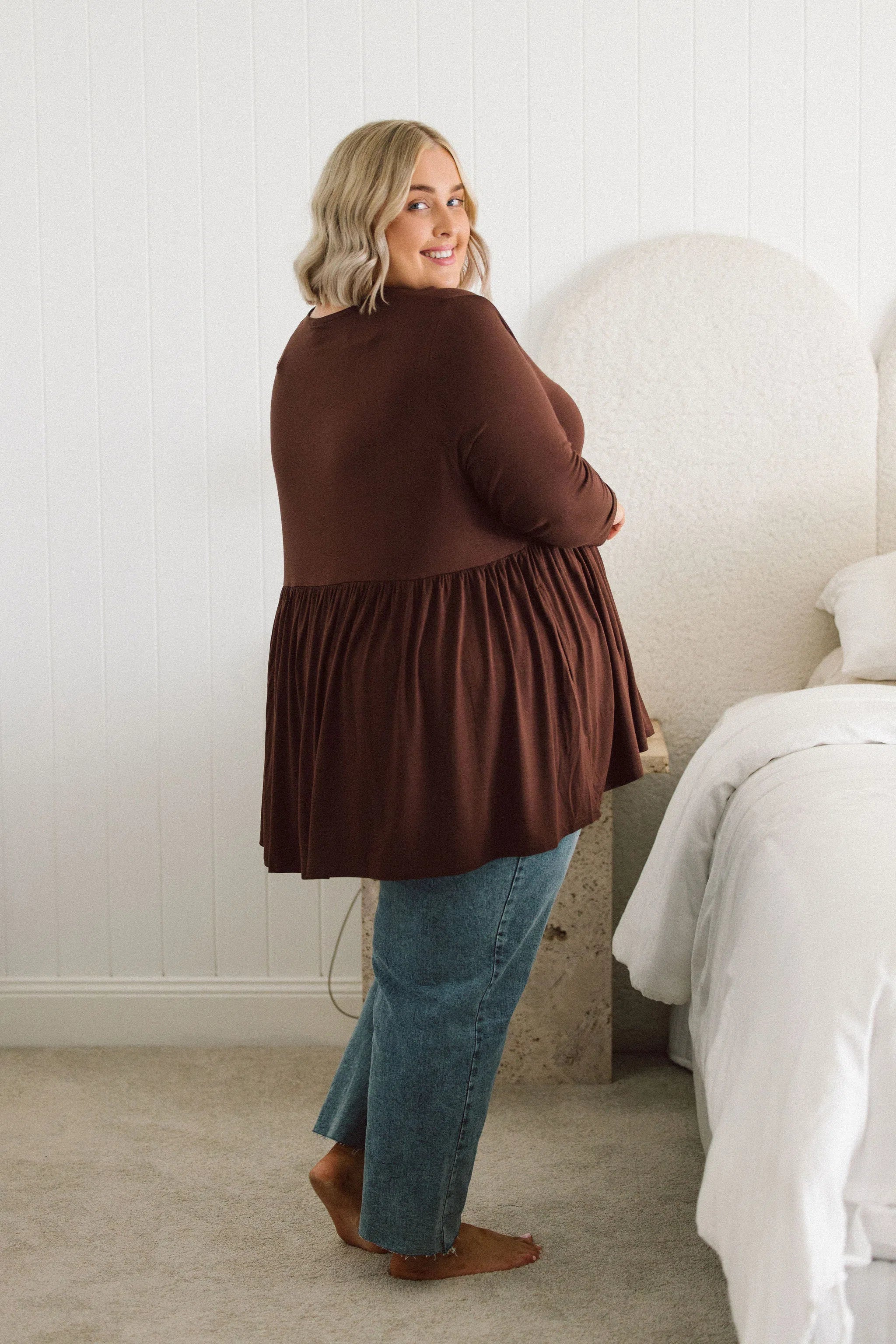 Plus Size clothing,  women modeling a winter Womens Plus Size Tops, Lucy Long Sleeve Top in Purple chocolate brown