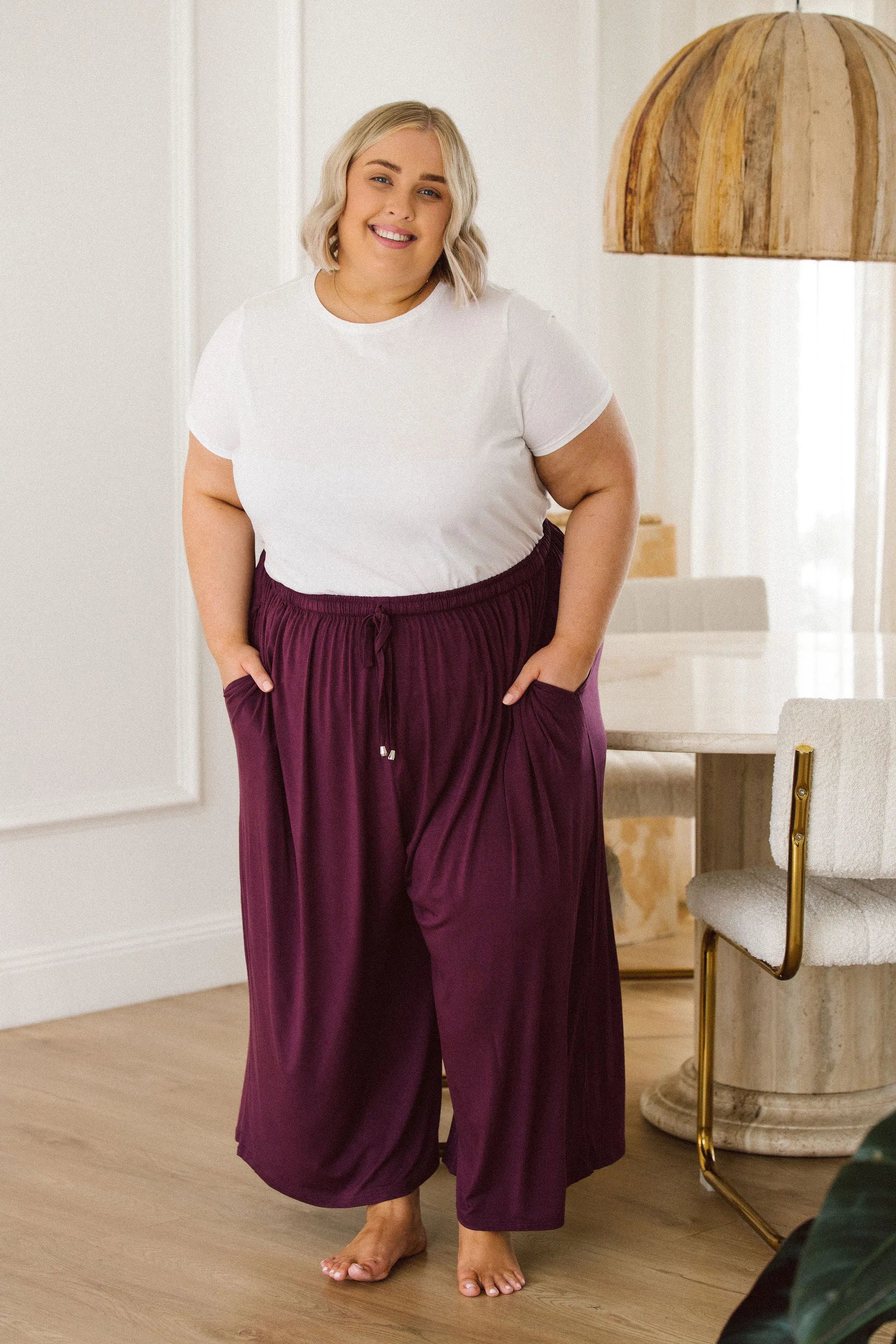 Model Wearing Women's Plus Size Pants - Darcy Pants in Berry