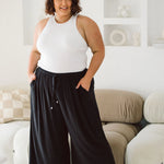 Model Flaunting Women's Plus Size Black Pants - Darcy Pants in Black