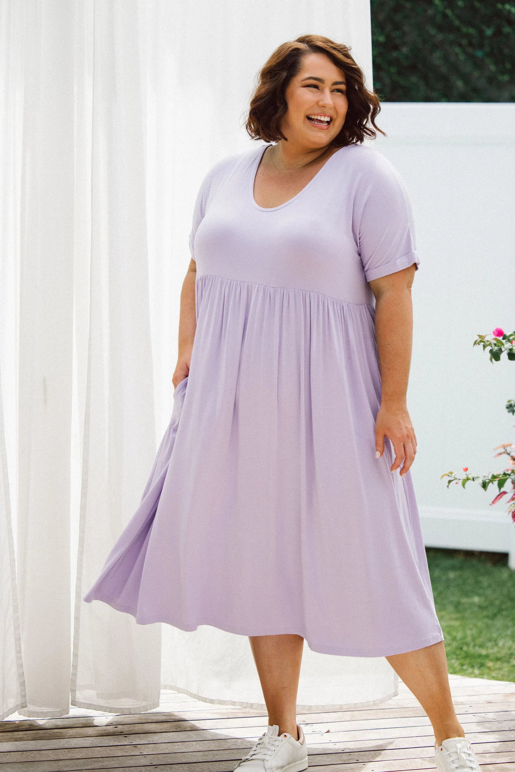 Curvy Model Wearing Womens Plus Size Dress in Lilac - Ashleigh Dress