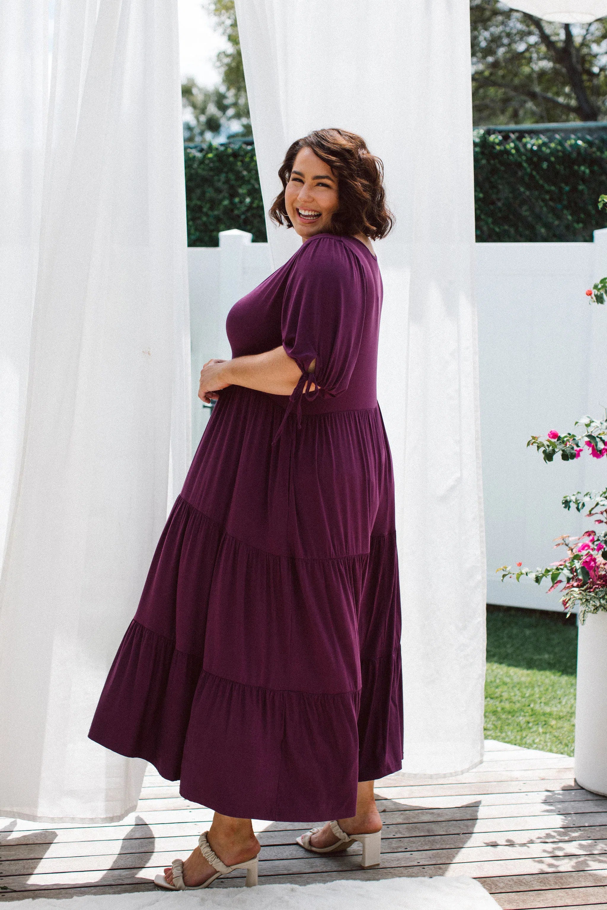 Model wearing plus size dress with pockets - Harlow Dress in Berry by Peach The Label
