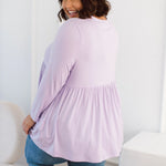 Plus Size clothing,  women modeling a Plus Size Tops, Lucy Long Sleeve Top in Purple Lilac