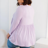 Plus Size clothing,  women modeling a Plus Size Tops, Lucy Long Sleeve Top in Purple Lilac