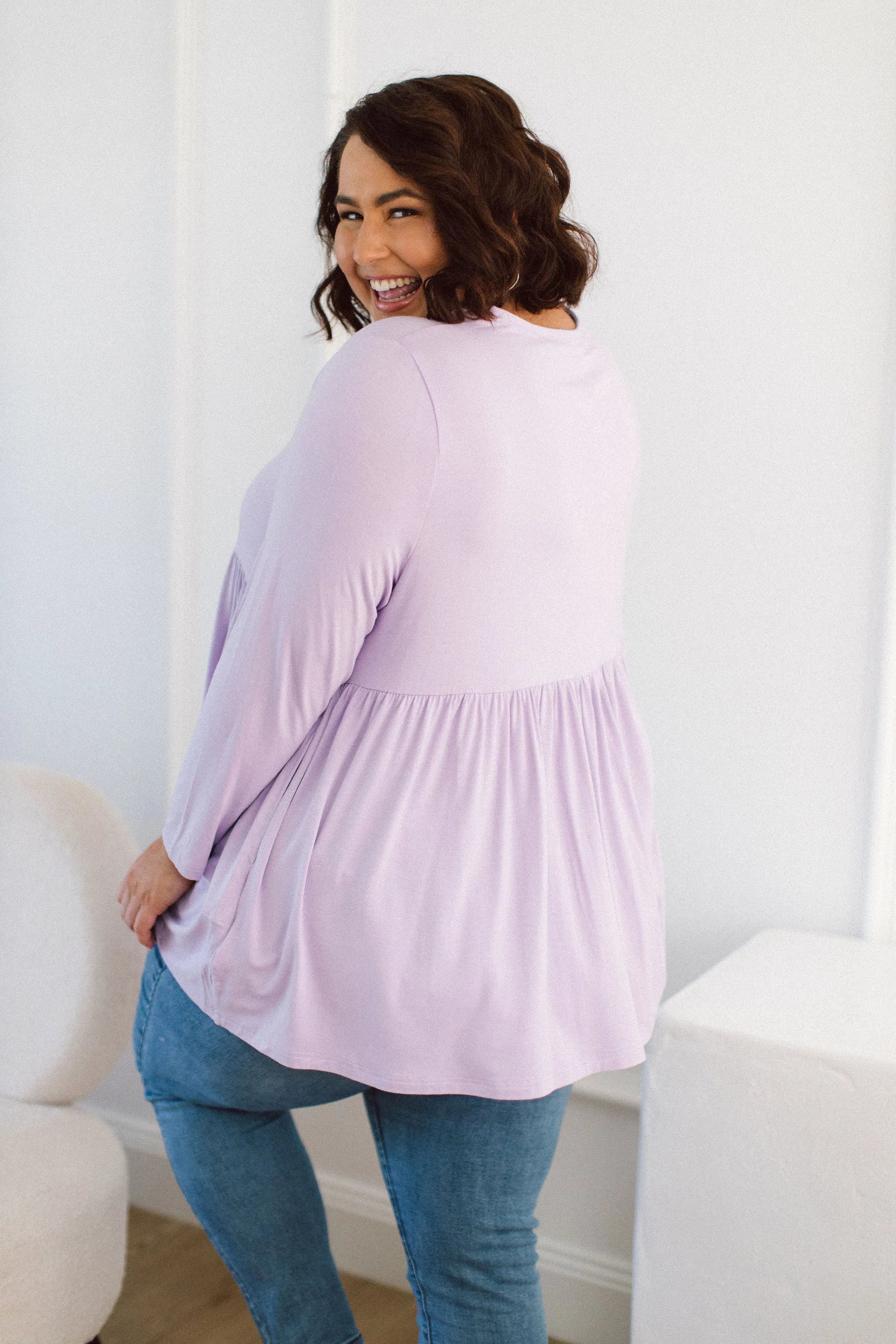 Plus Size clothing,  women modeling a Plus Size Tops, Lucy Long Sleeve Top in Purple Lilac
