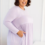 Plus Size clothing,  women modeling a Curvy Womens Tops, Lucy Long Sleeve Top in Purple Lilac