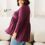 Plus Size clothing,  women modeling a Plus size womens shirt, Lucy Long Sleeve Top in Purple berry