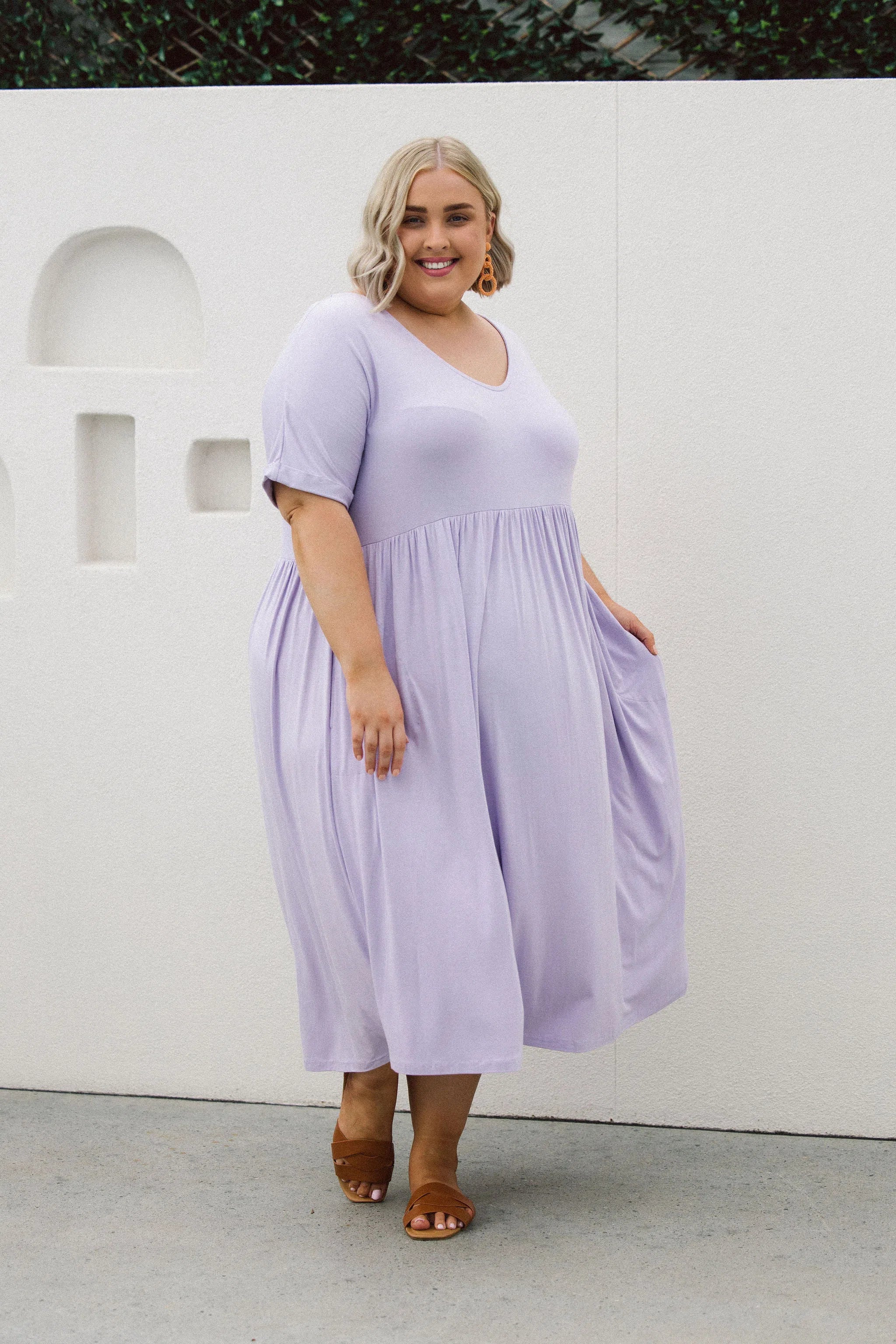 Model presenting women's plus size dress online - Ashleigh Dress in Lilac by Peach The Label