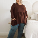 Plus Size clothing,  women modeling a winter Curvy Womens Tops, Lucy Long Sleeve Top in Purple chocolate brown