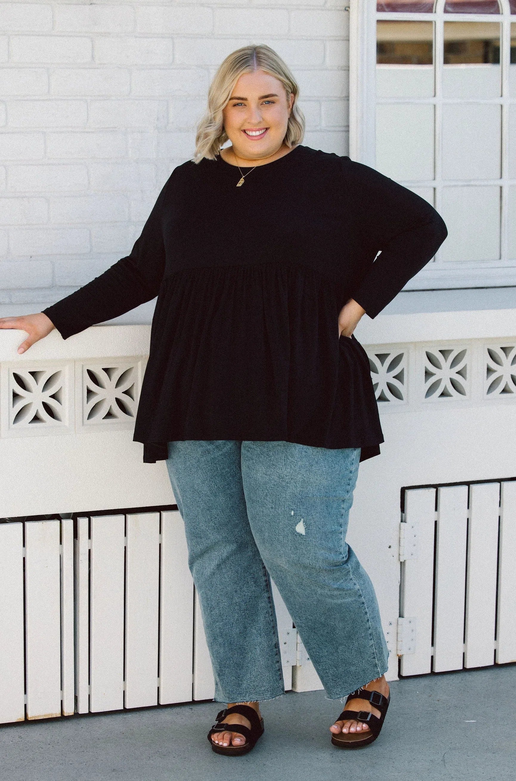 Plus Size clothing,  women modeling a black Womens Plus Size Tops, Lucy Long Sleeve Top in black