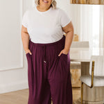 Model Wearing Women's Plus Size Pants - Darcy Pants in Berry