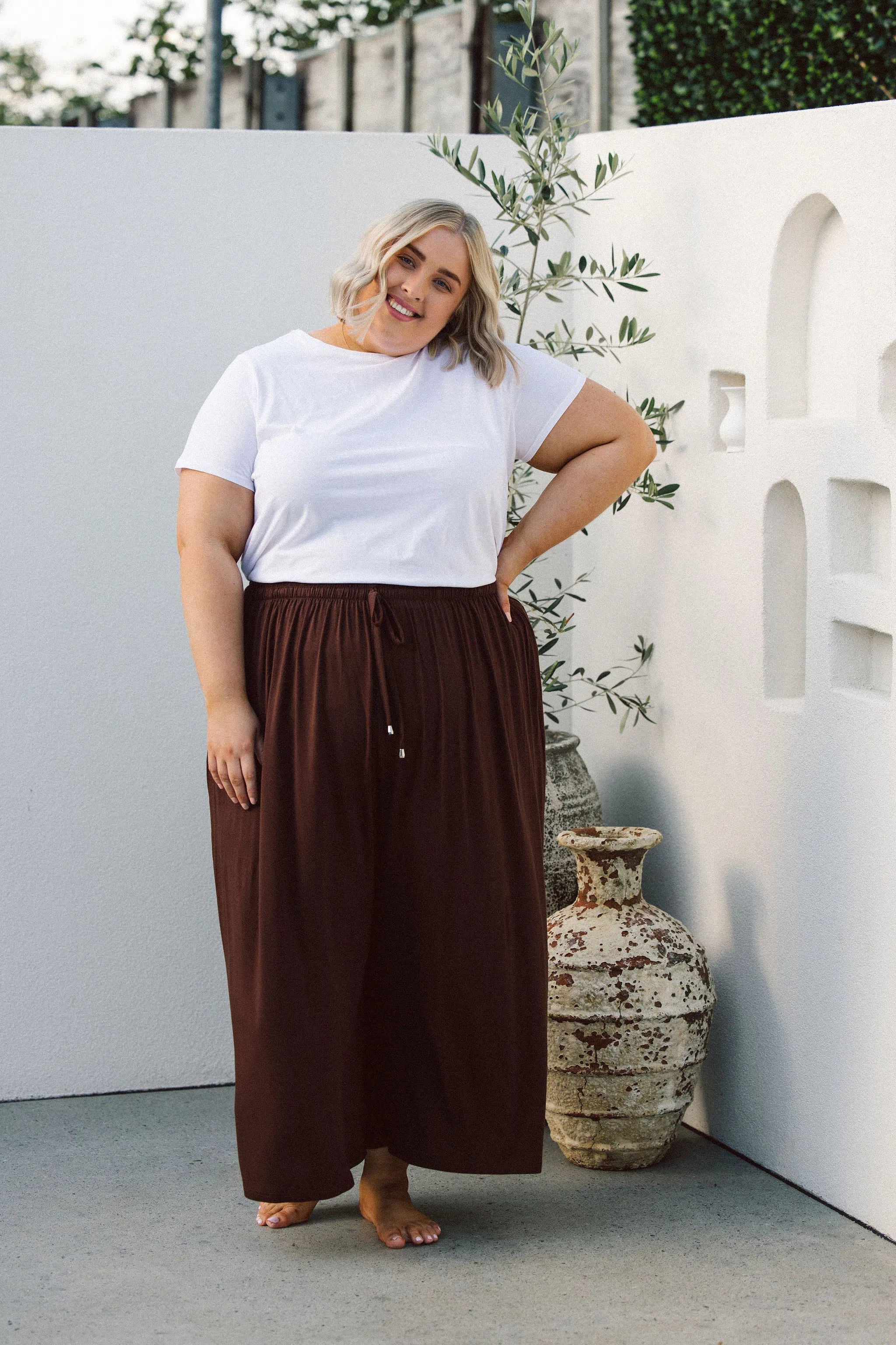 Model Wearing Women's Plus Size Brown Pants - Darcy Pants in Chocolate Brown