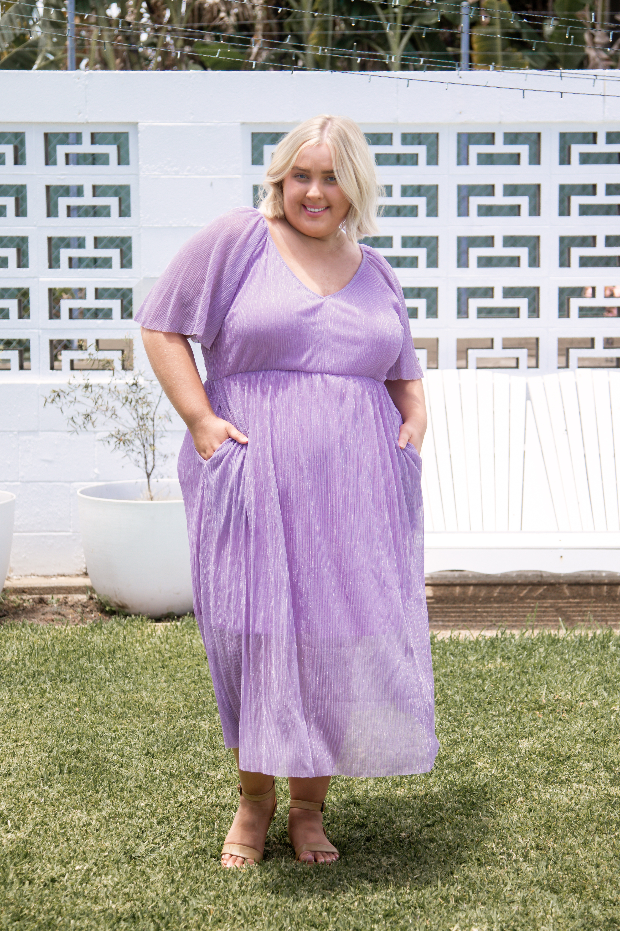 Model showcasing curvy plus size evening dress - Nova Dress in Amethyst Sparkle by Peach The Label